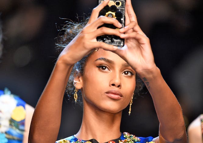 september 2015_ dolce_gabbana ready to wear spring summer 2016 milan face person human finger mobile phone electronics phone cell phone