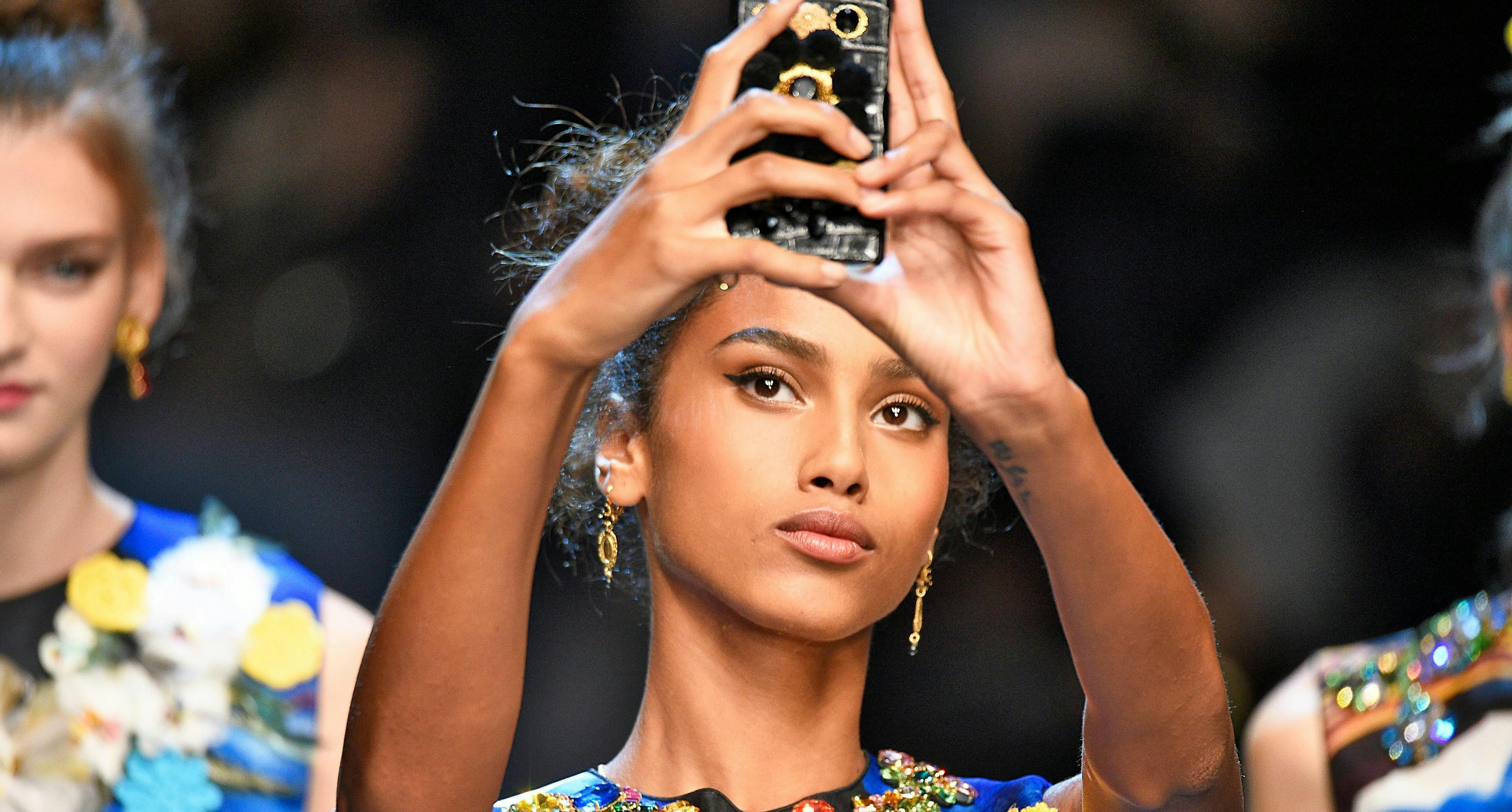 september 2015_ dolce_gabbana ready to wear spring summer 2016 milan face person human finger mobile phone electronics phone cell phone