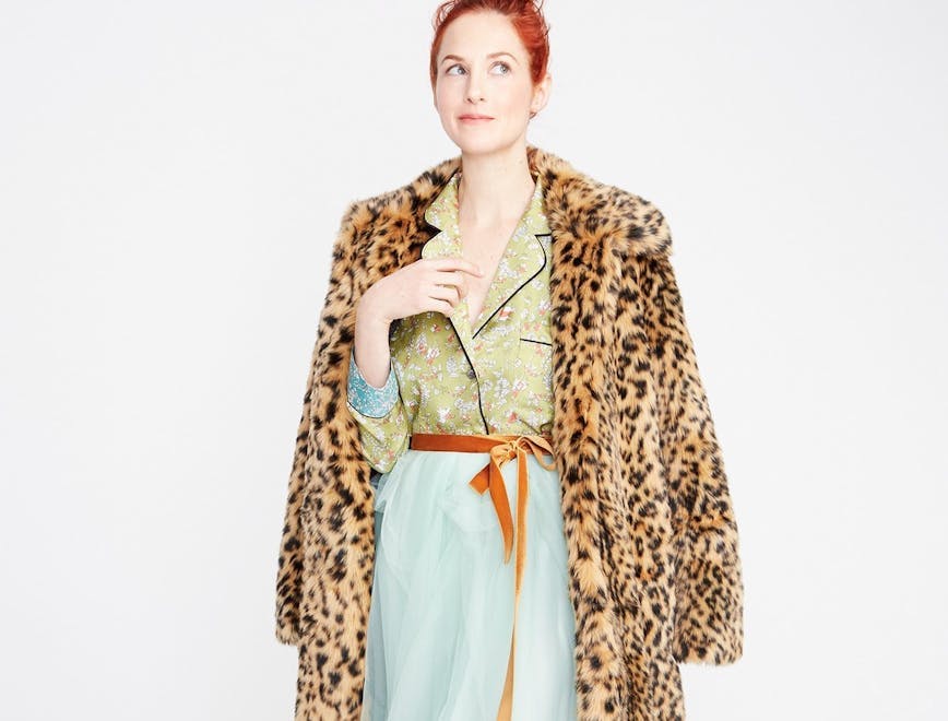 clothing apparel dress female person human sleeve coat overcoat woman