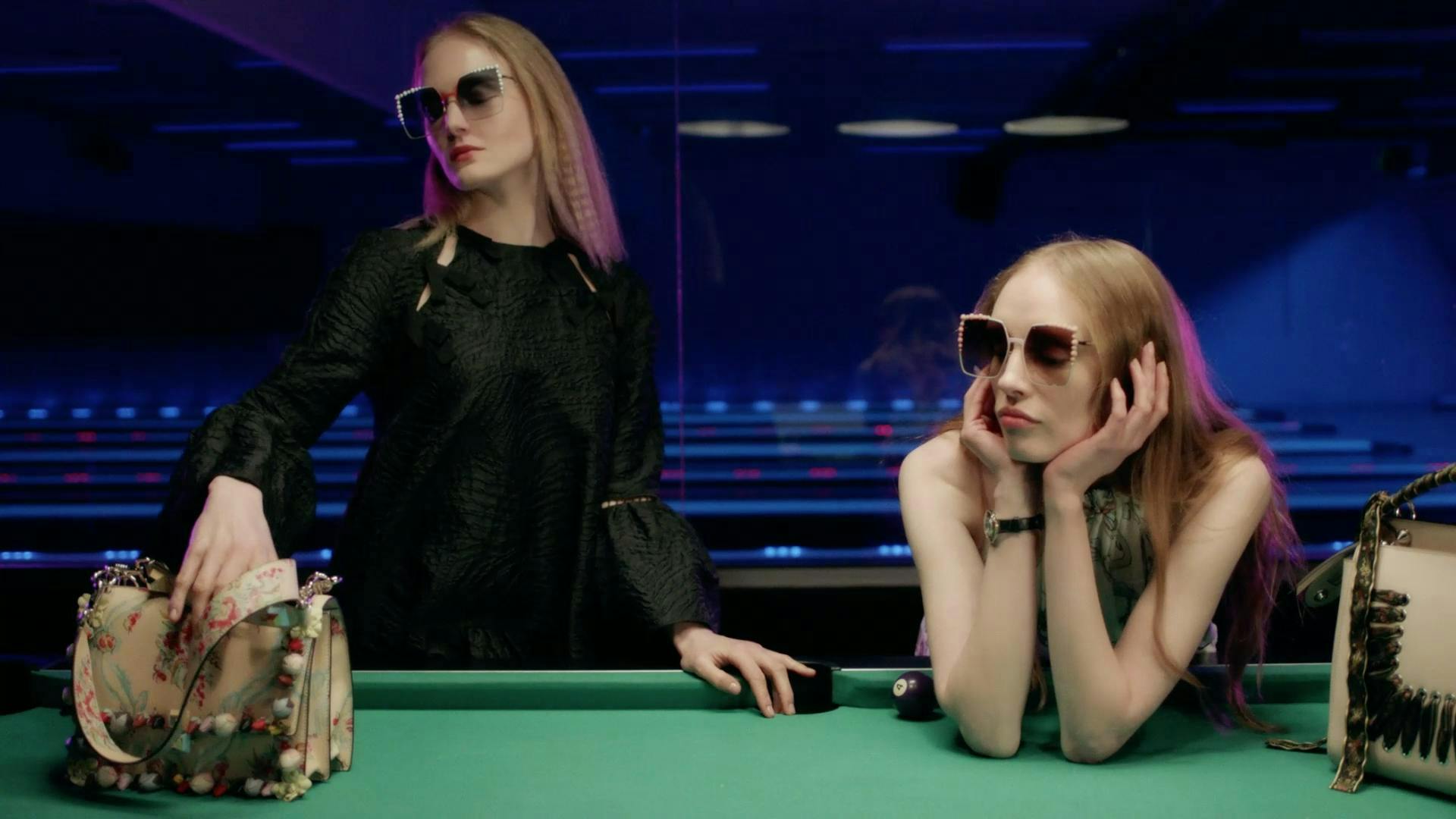 person human furniture room indoors sunglasses accessories table billiard room pool table