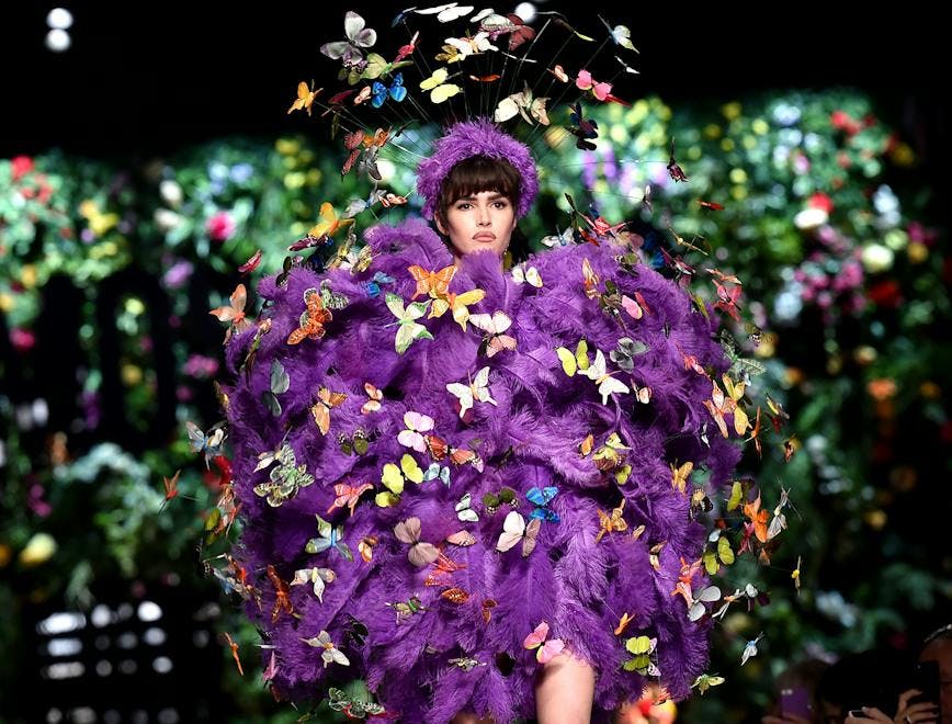 clothing apparel person human festival crowd plant purple