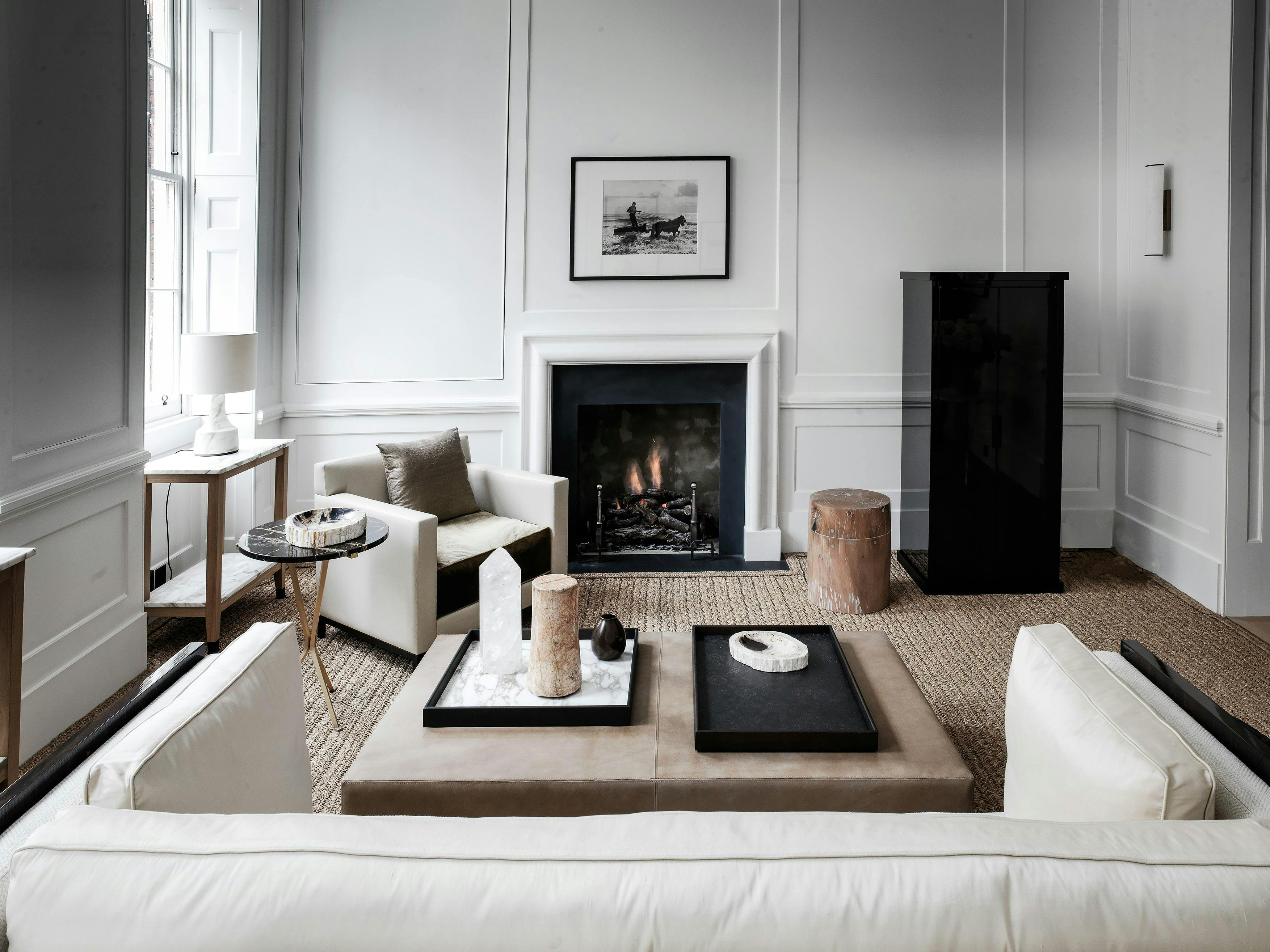 furniture indoors rug living room room table interior design fireplace