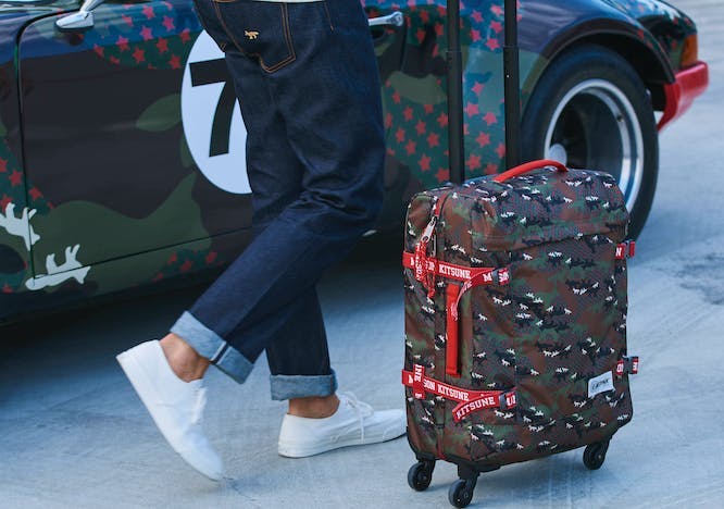 shoe footwear clothing wheel machine car transportation pants person luggage