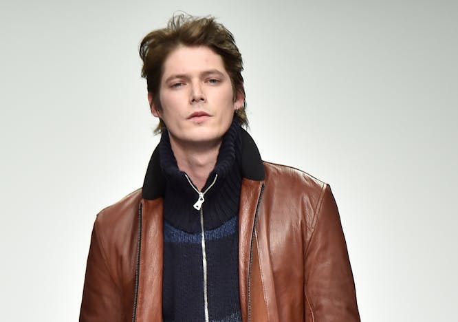 clothing apparel jacket coat leather jacket person human