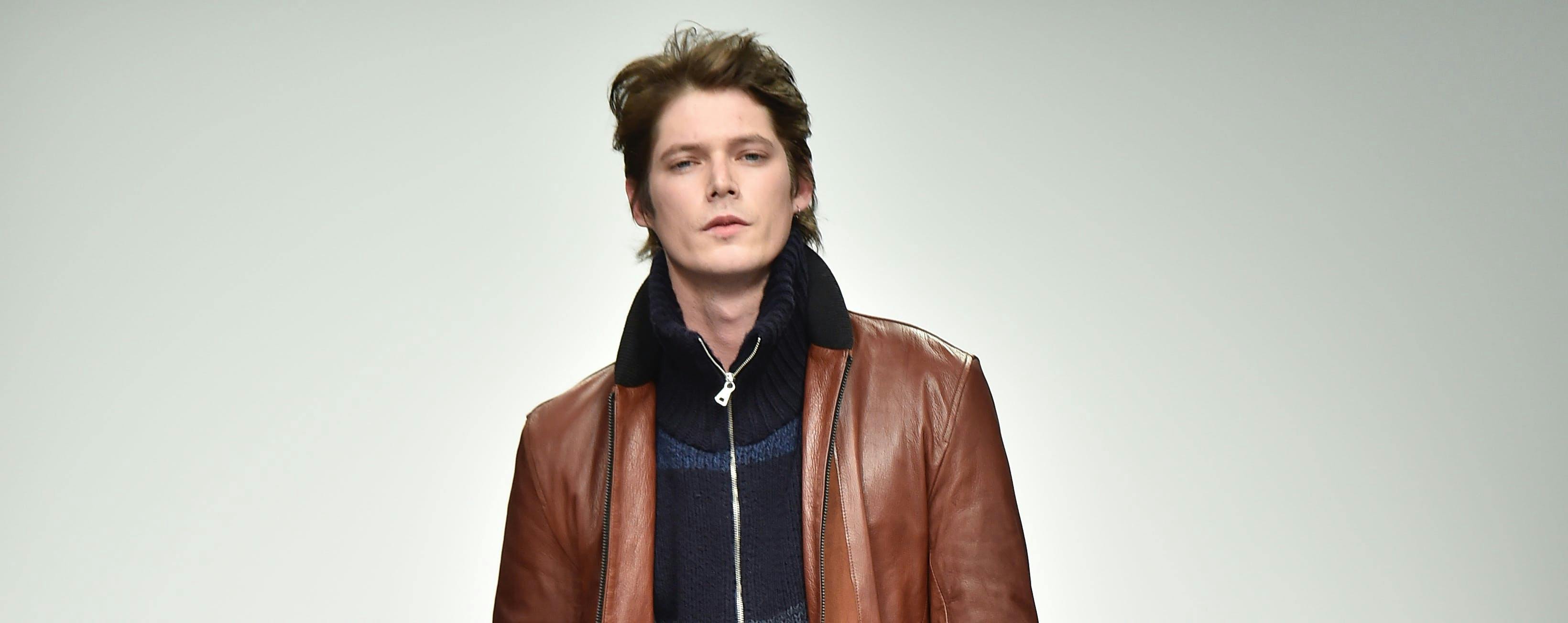 clothing apparel jacket coat leather jacket person human