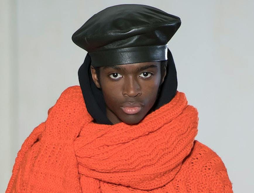 clothing apparel person human helmet scarf