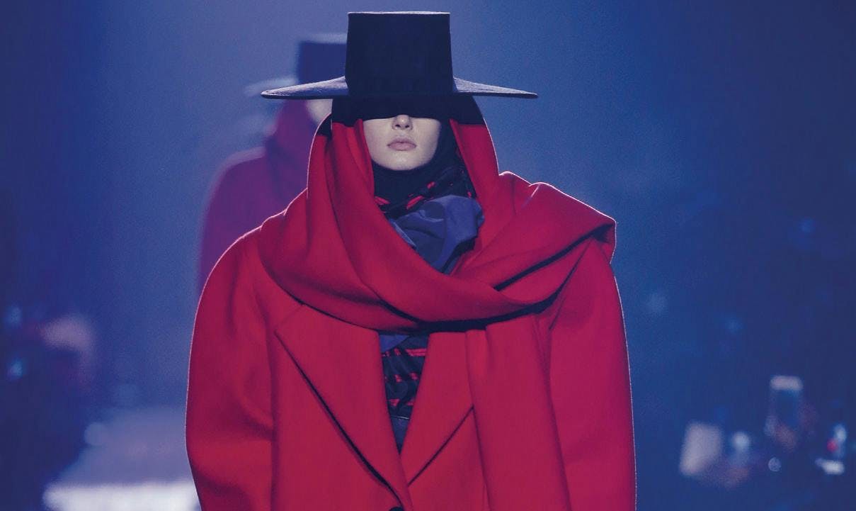 clothing apparel hat person human cloak fashion