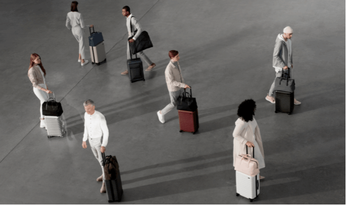 person human luggage airport shoe clothing footwear apparel