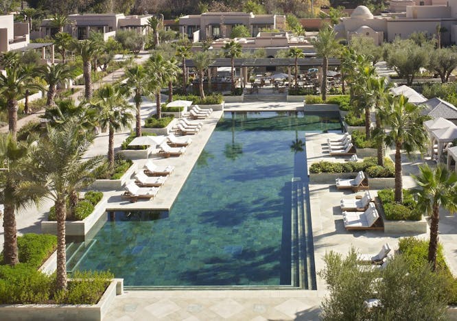 resort hotel building outdoors bird animal water pool housing