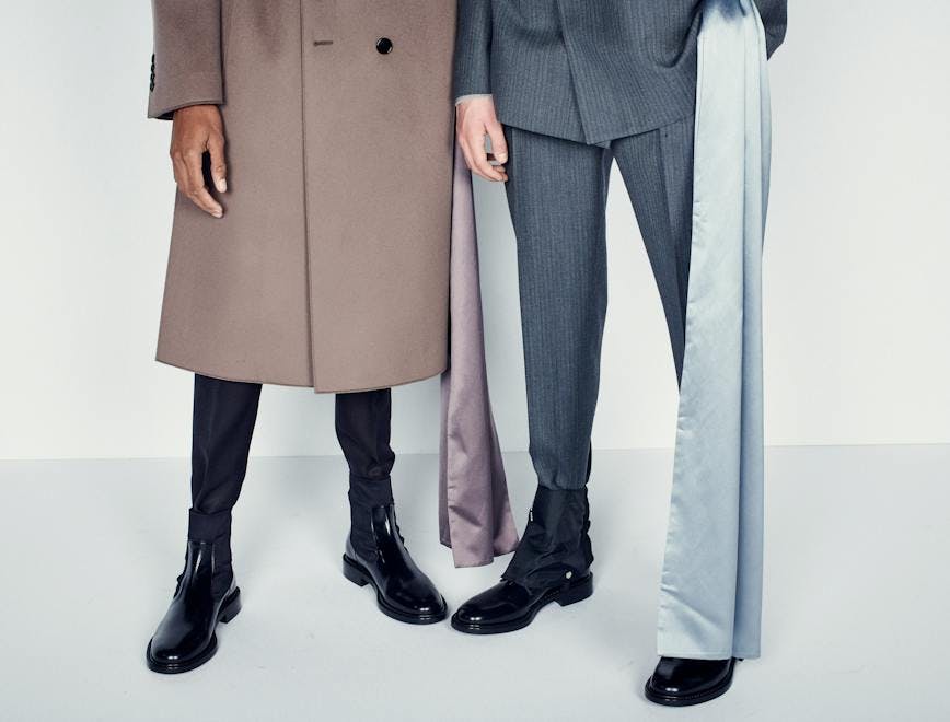 clothing apparel overcoat coat suit person human tuxedo