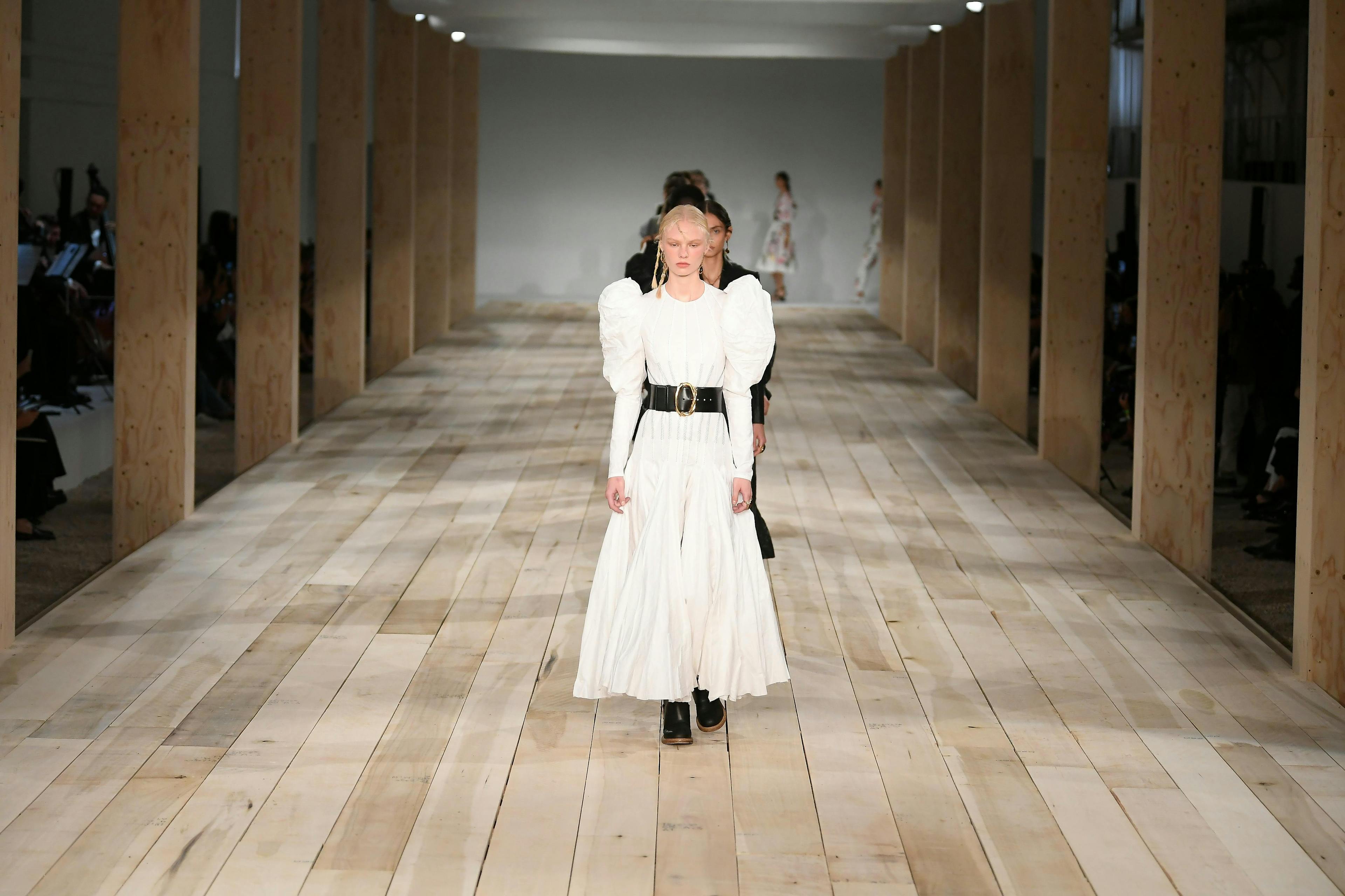 flooring person human floor clothing apparel female corridor sleeve