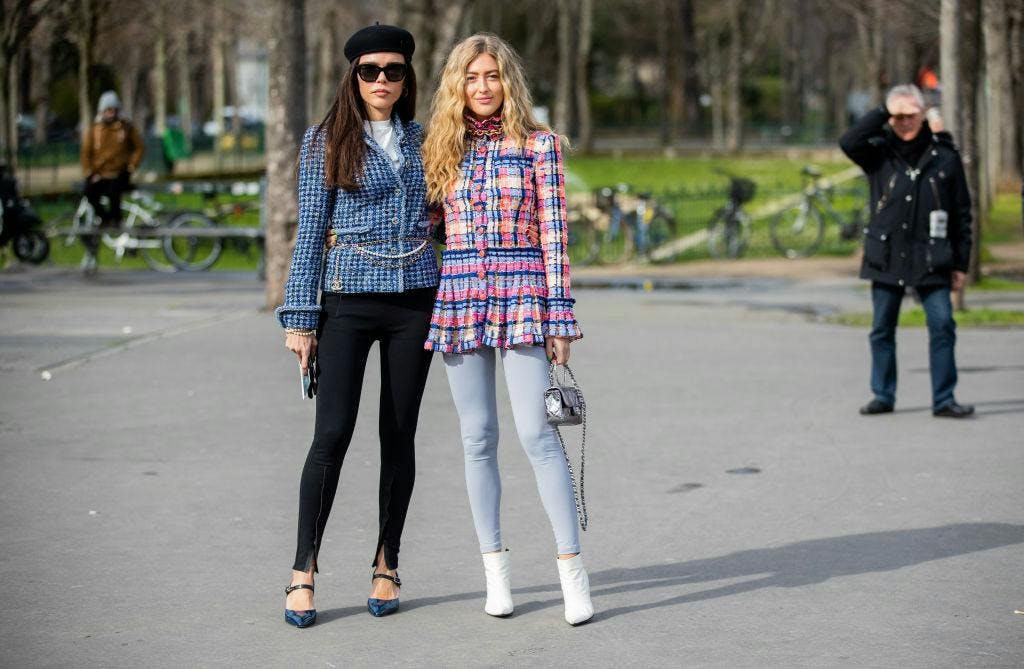 paris shoe clothing footwear pants person female blonde woman bicycle sunglasses