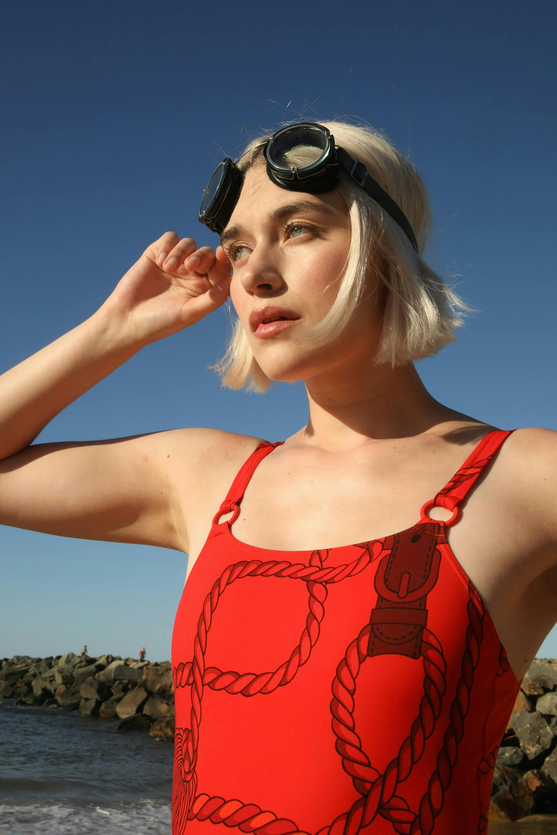 clothing apparel sunglasses accessories accessory person human goggles finger swimwear