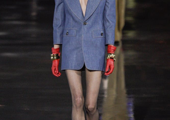 clothing sunglasses runway person female suit coat blazer woman fashion