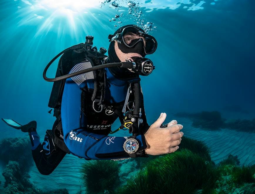 water outdoors person human diving diver sport scuba diving adventure leisure activities