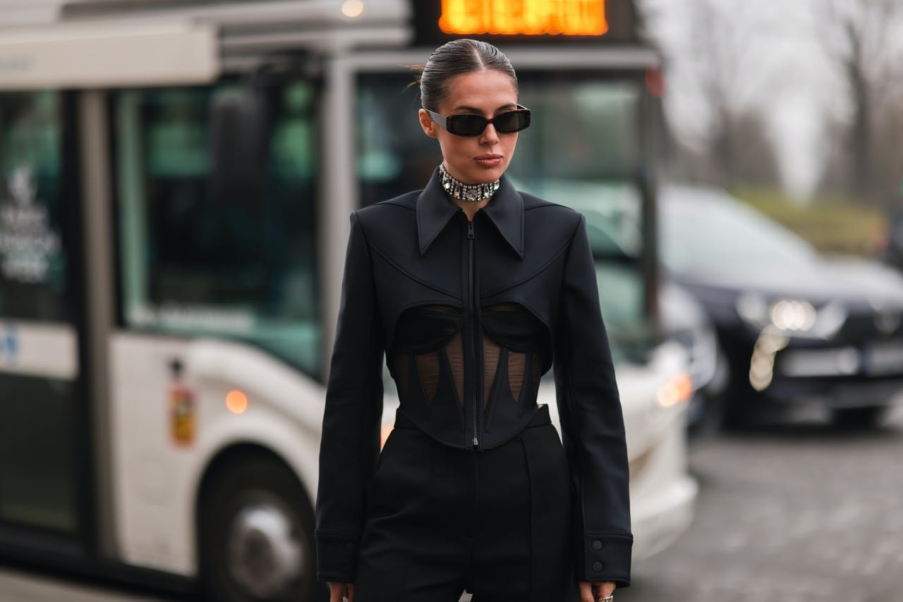 clothing sunglasses accessories person suit overcoat coat car transportation vehicle