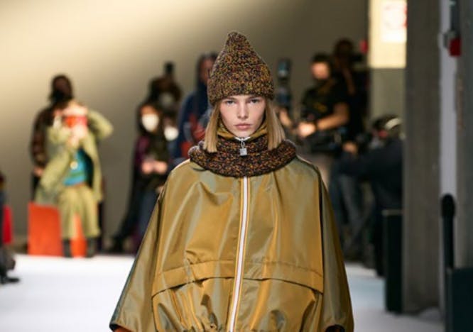 coat clothing apparel person human runway fashion costume