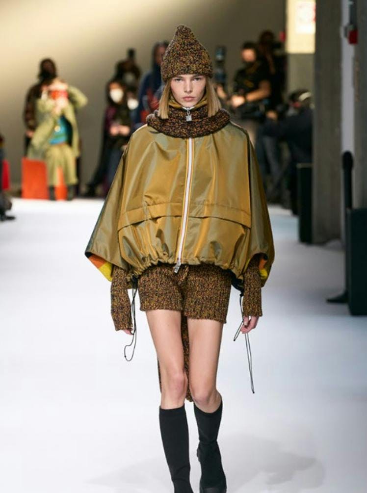 coat clothing apparel person human runway fashion costume