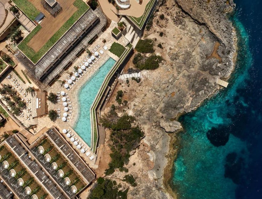 sea outdoors water nature pool swimming pool coast shoreline aerial view building