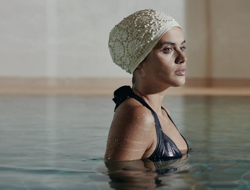 hat cap clothing swimwear person woman adult female bathing bathing cap