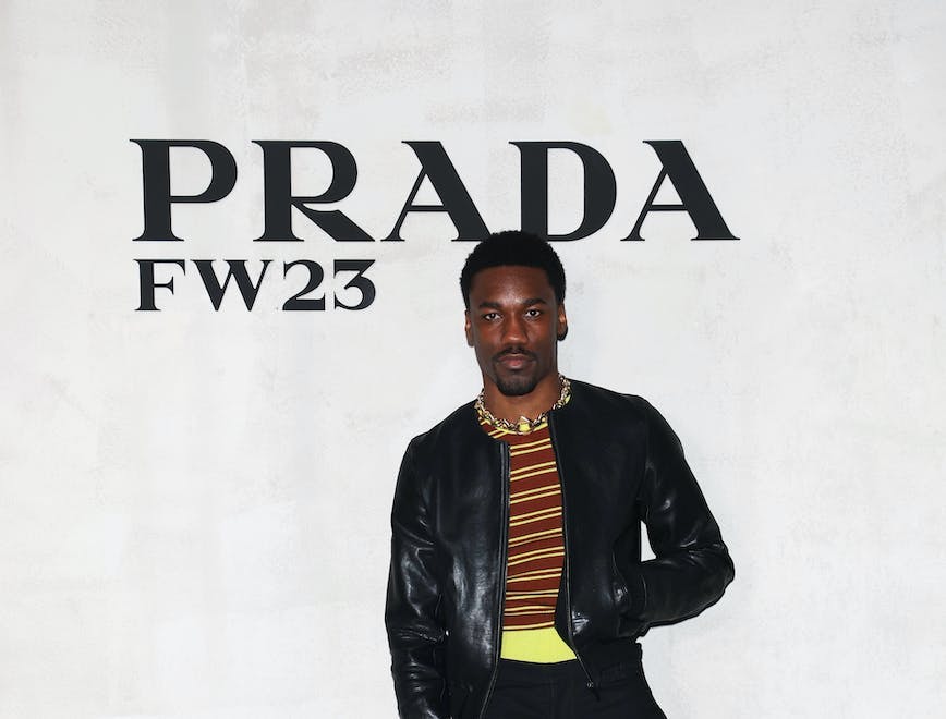 arts culture and entertainment fashion prada arrival fashion show menswear milan fashion week milan coat jacket standing person man adult male suit formal wear ring