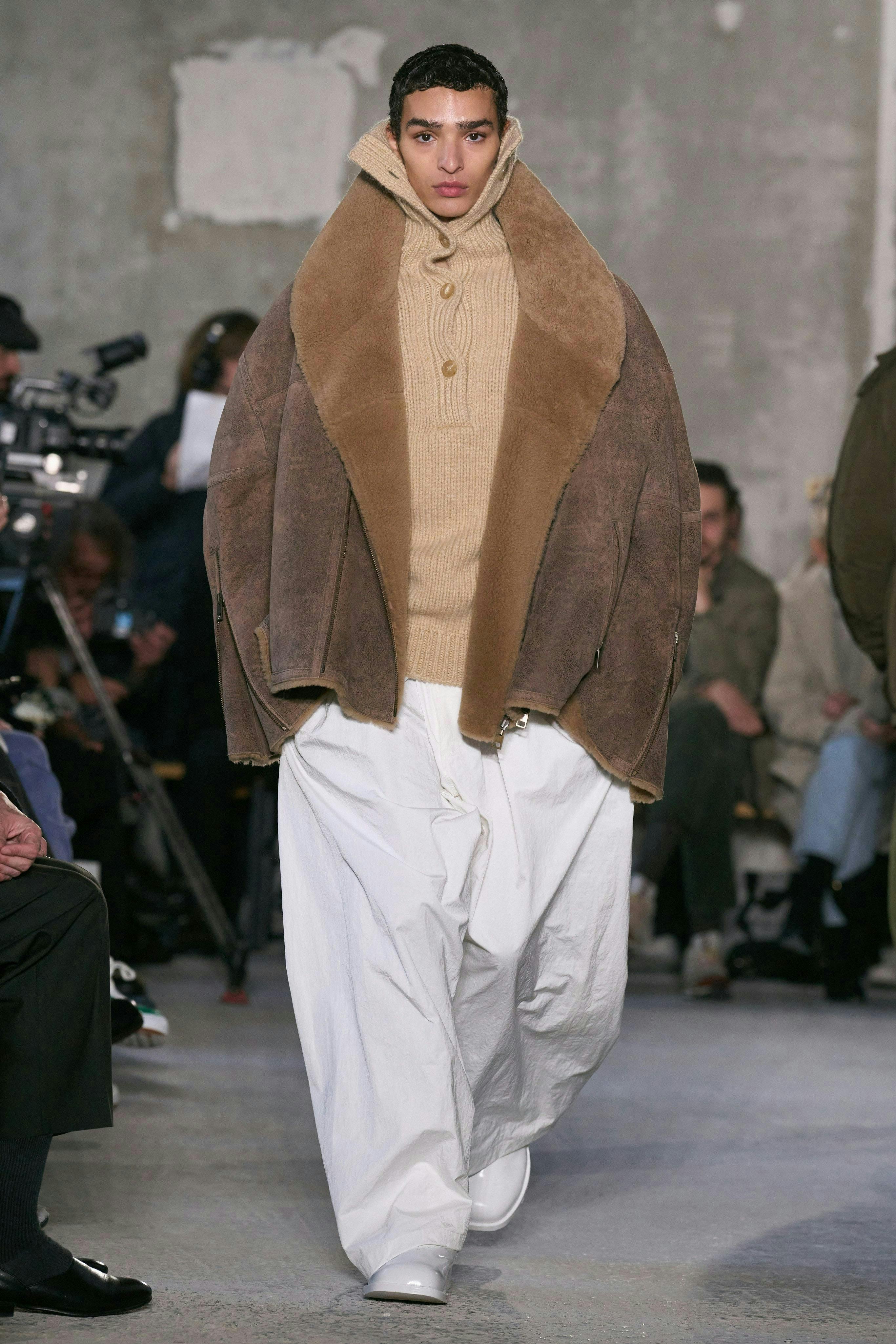 fashion clothing coat jacket adult male man person footwear shoe