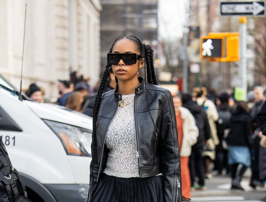 new york coat jacket pedestrian person handbag adult female woman skirt tarmac